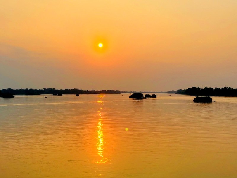 Si Phan Don zonsondergang | Riksja Laos